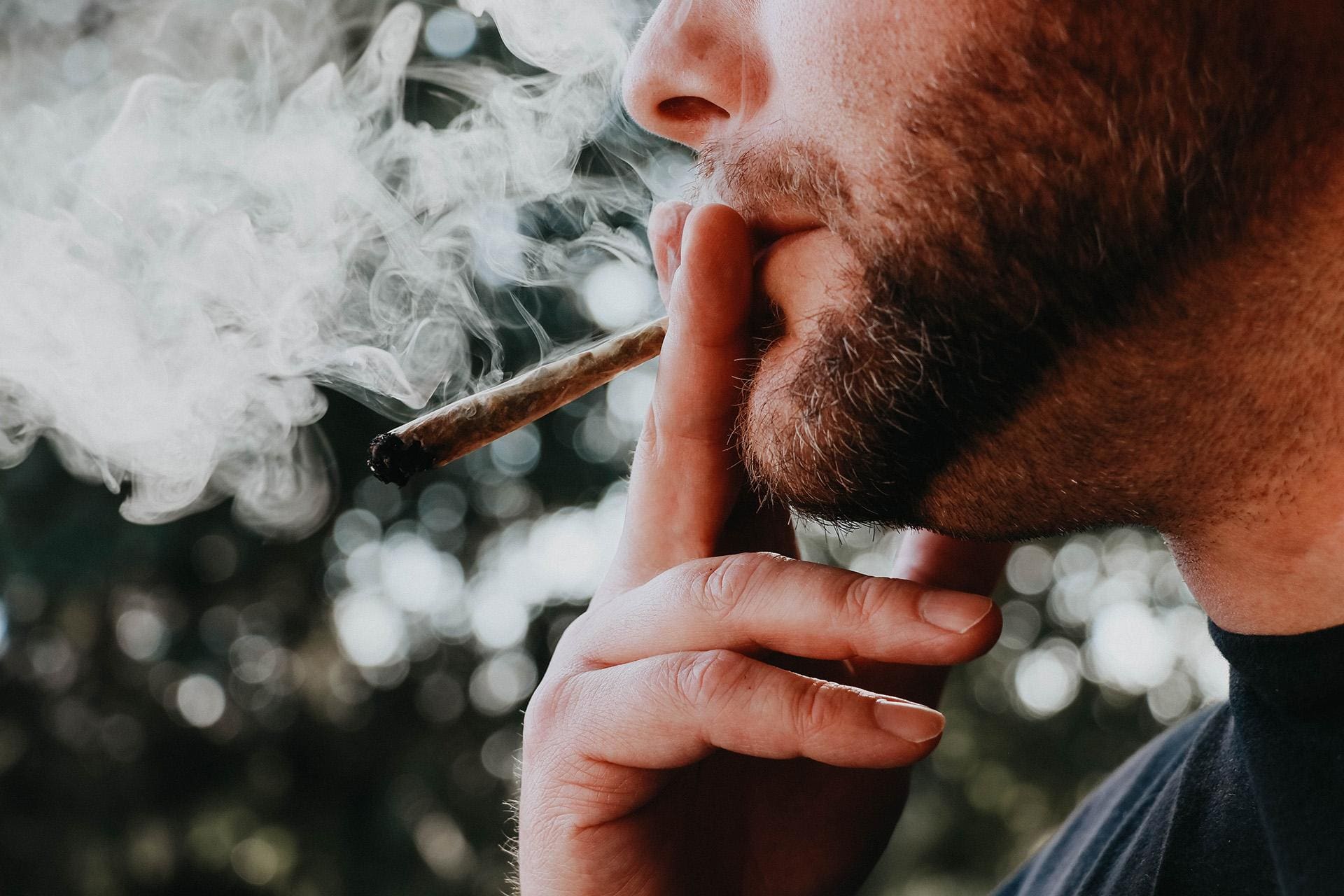 Man smoking a joint