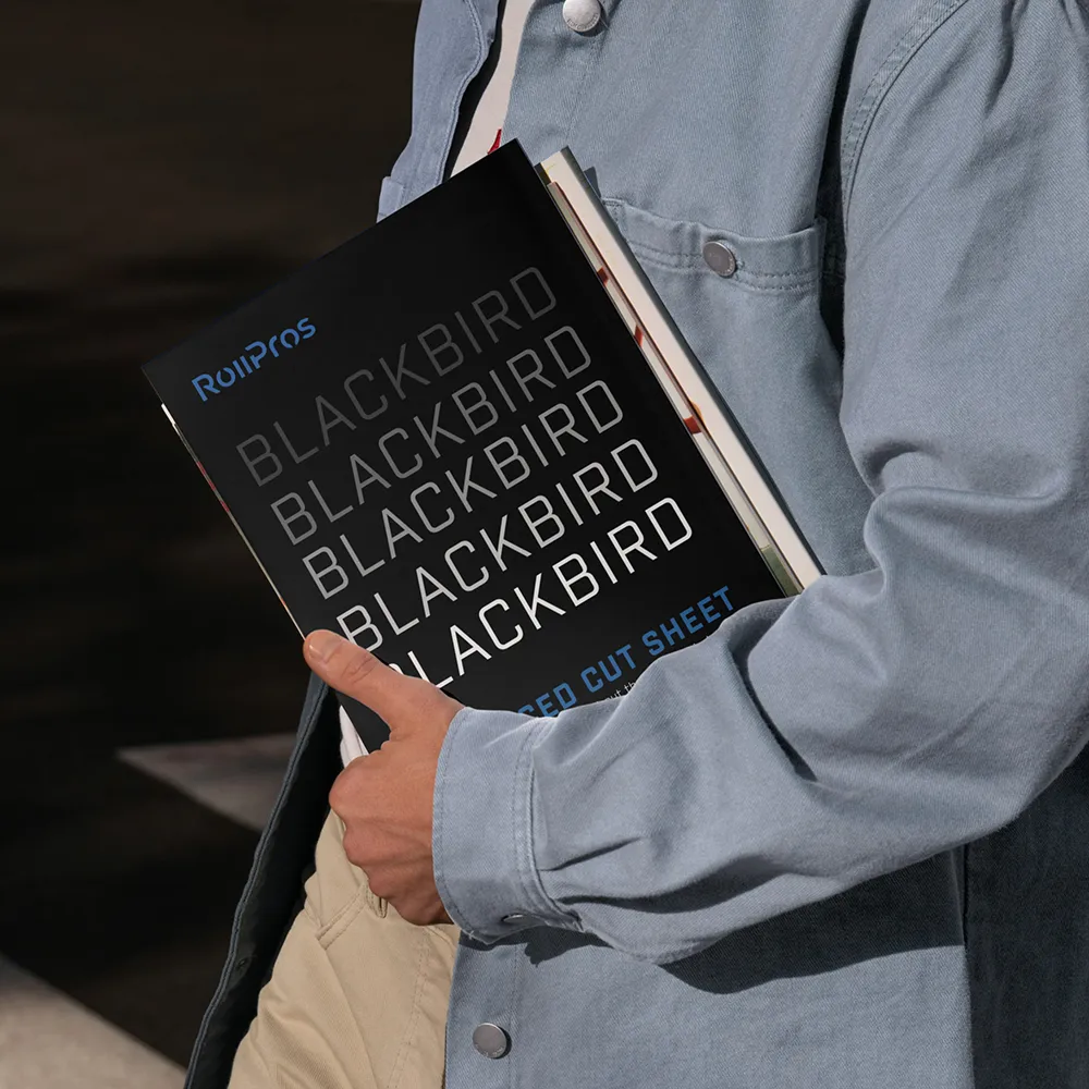 ROLL-Blackbird-Advanced-Sheet-2 person holding a blackbird brochure