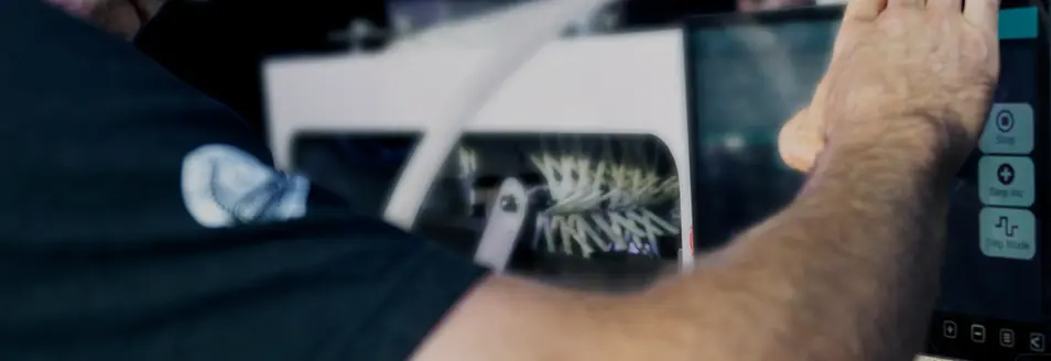 Why Buy a Pre-Roll? technician rolling blunts on a Blackbird XXL machine